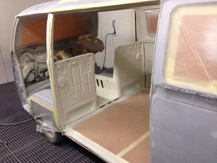 VW Campervan taped up and empty for restoration.