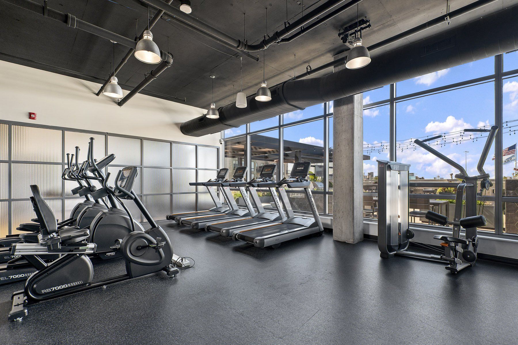 Fitness center with treadmills at Reside on Green Street.