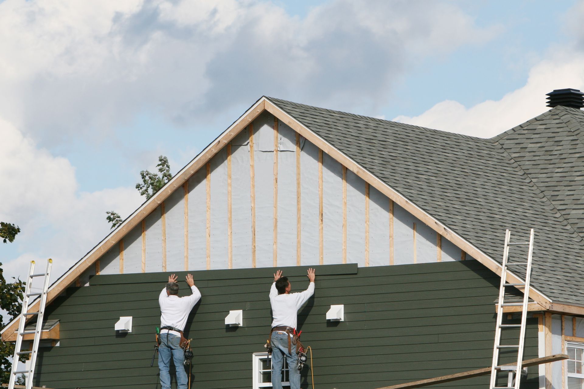 Workers Installing House Siding — Frankfort, NY — Upstate Home Improvements