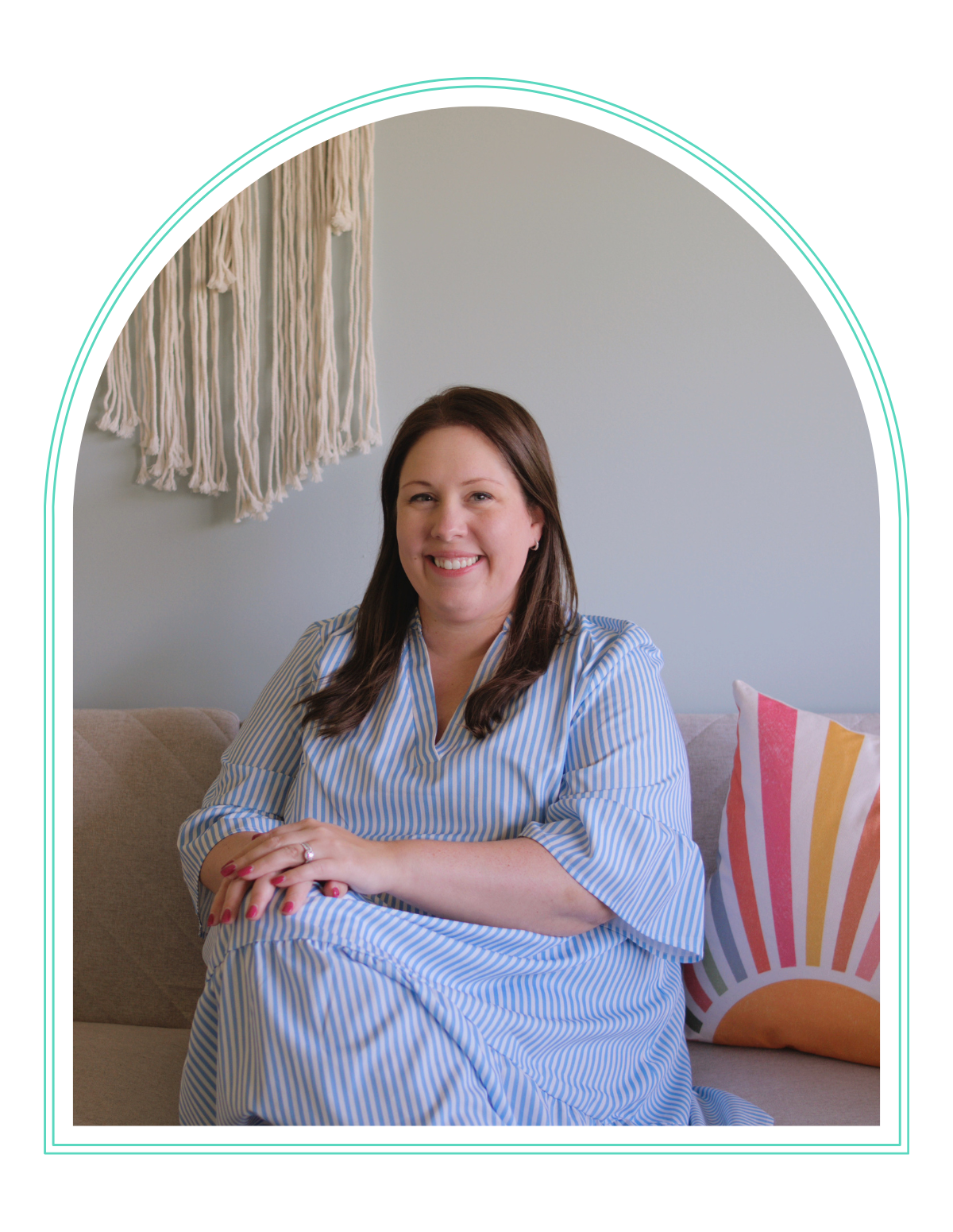 a woman is sitting in a chair holding a cup of coffee