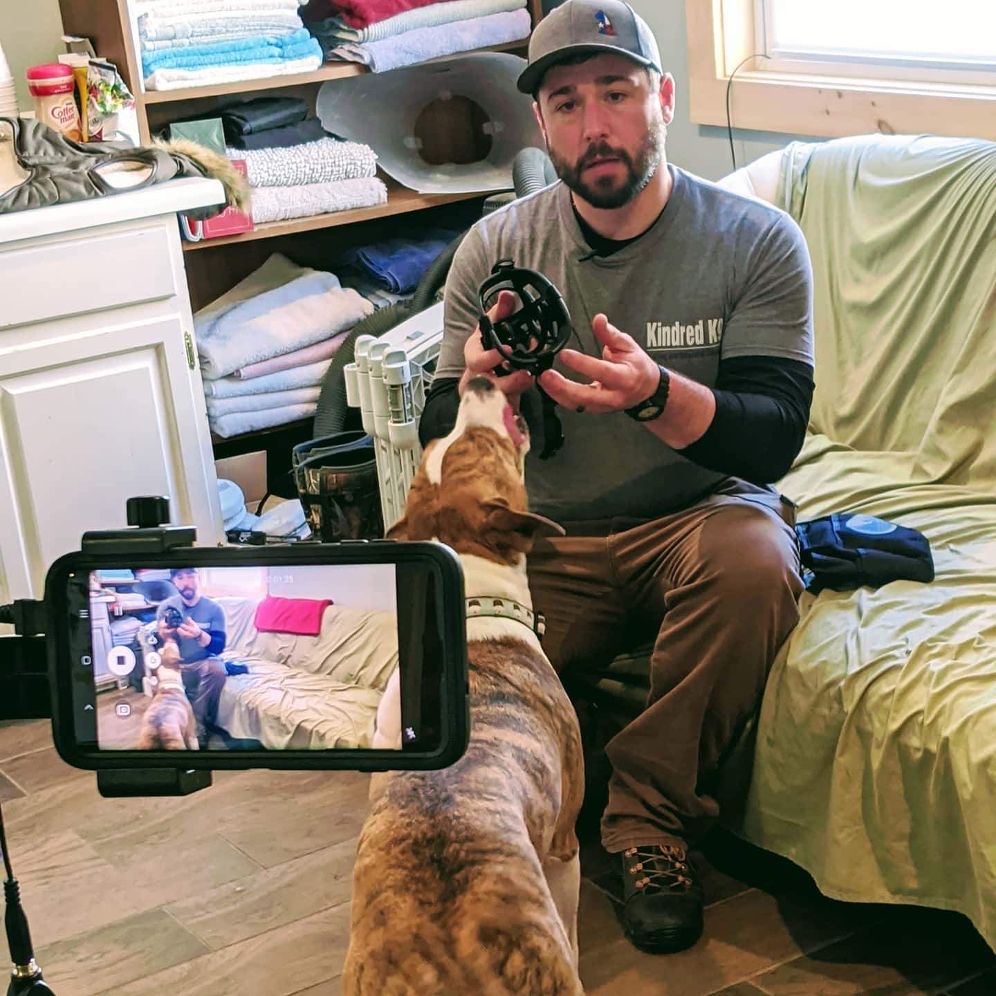 Jeff recording a video about putting muzzles of dogs