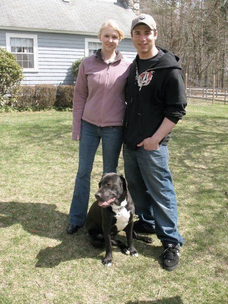 The founders of Off the Beaten Trail in Newark, VT posing with a dog.