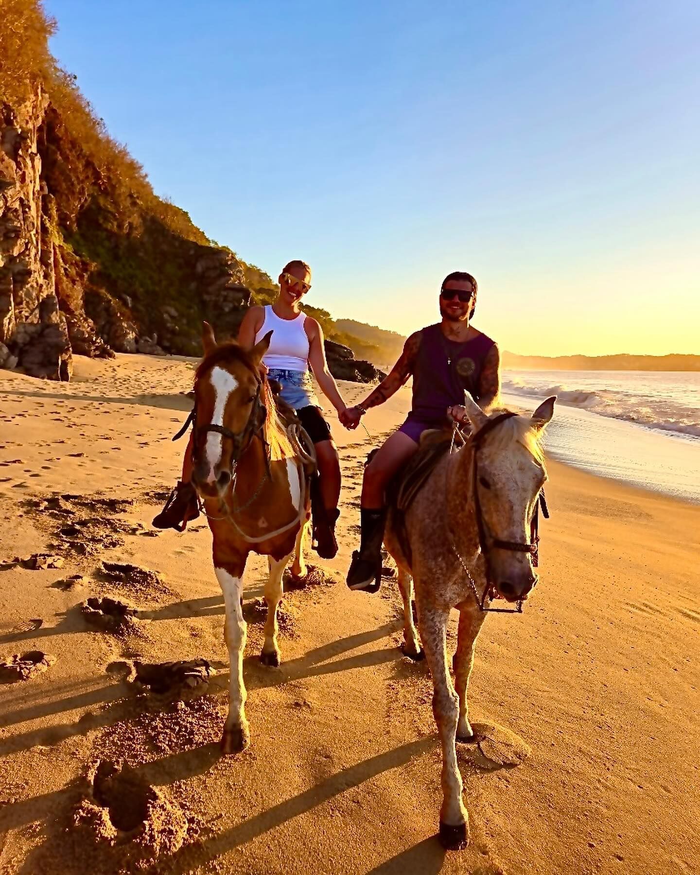Travis Bertram with his wife and daughter