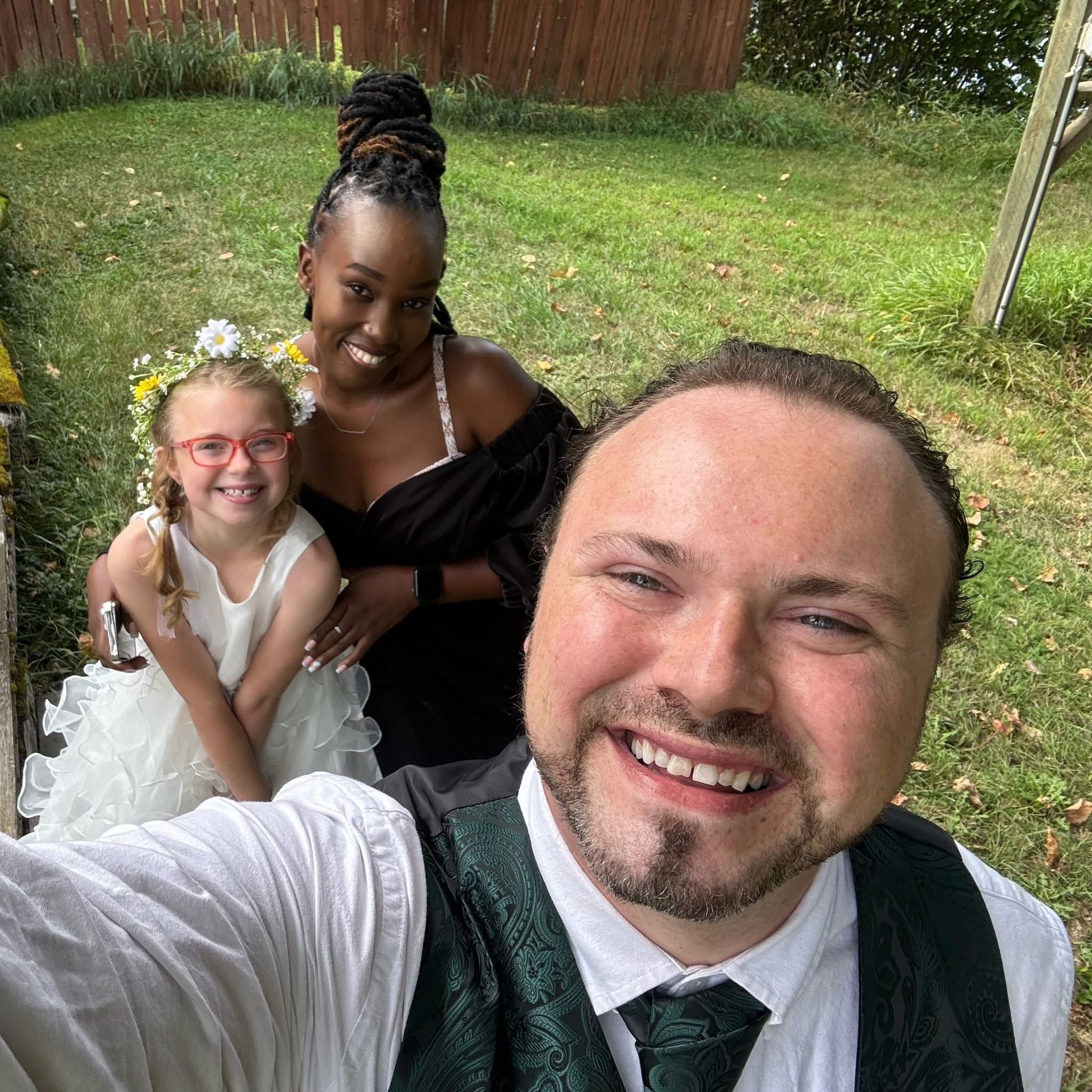 Travis Bertram with his wife and daughter