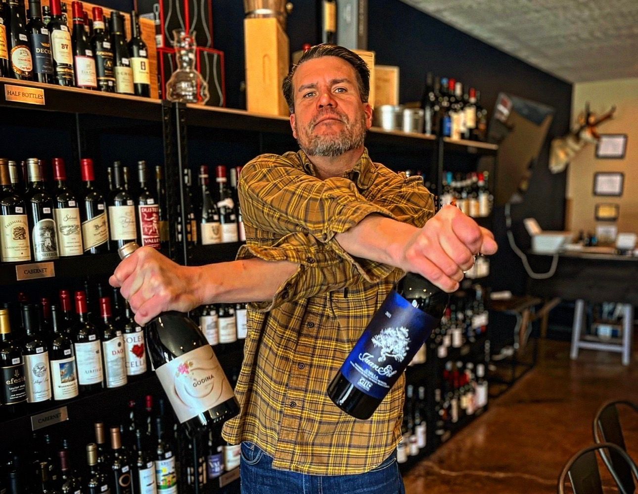 Travis Bertram filming a production with a Sony camcorder back ini 2015