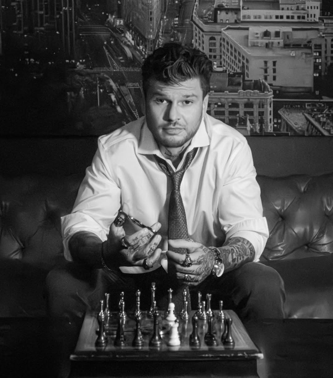 Travis Bertram with his wife and daughter