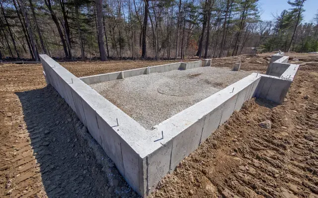 repair of a dark cream colour wall with stucco