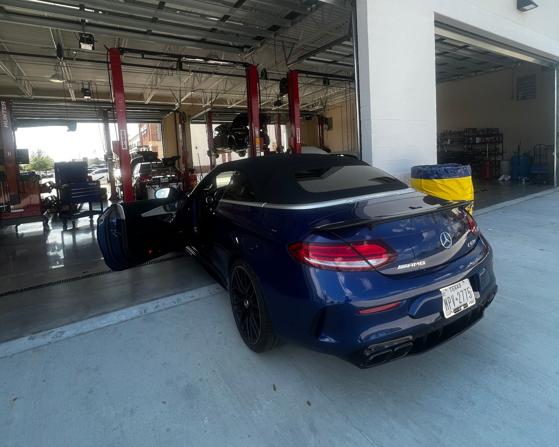 Blue Car Inside Auto Service Bay | Locals Automotive Repair