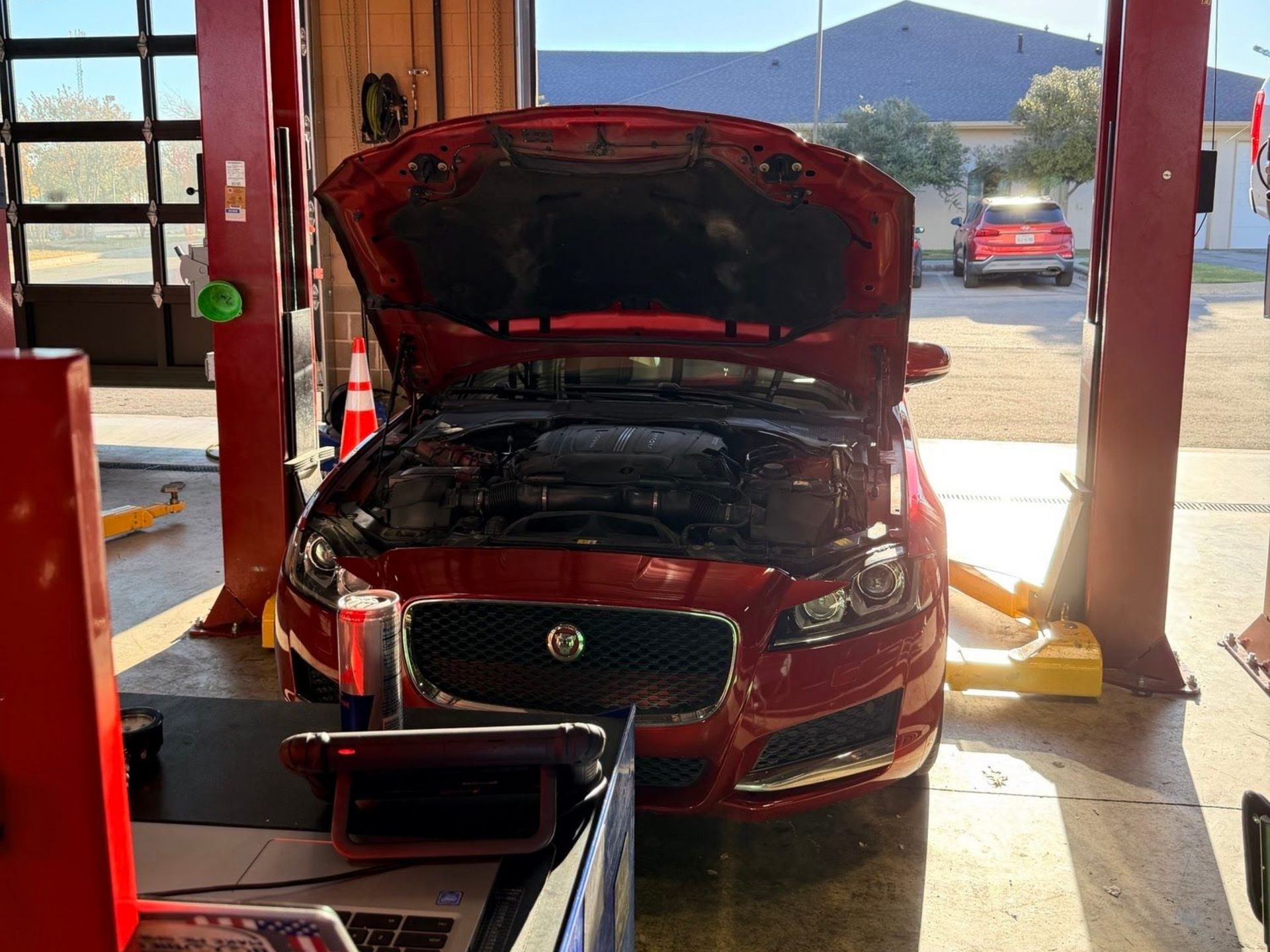 Red Sedan In Service Bay | Locals Automotive Repair