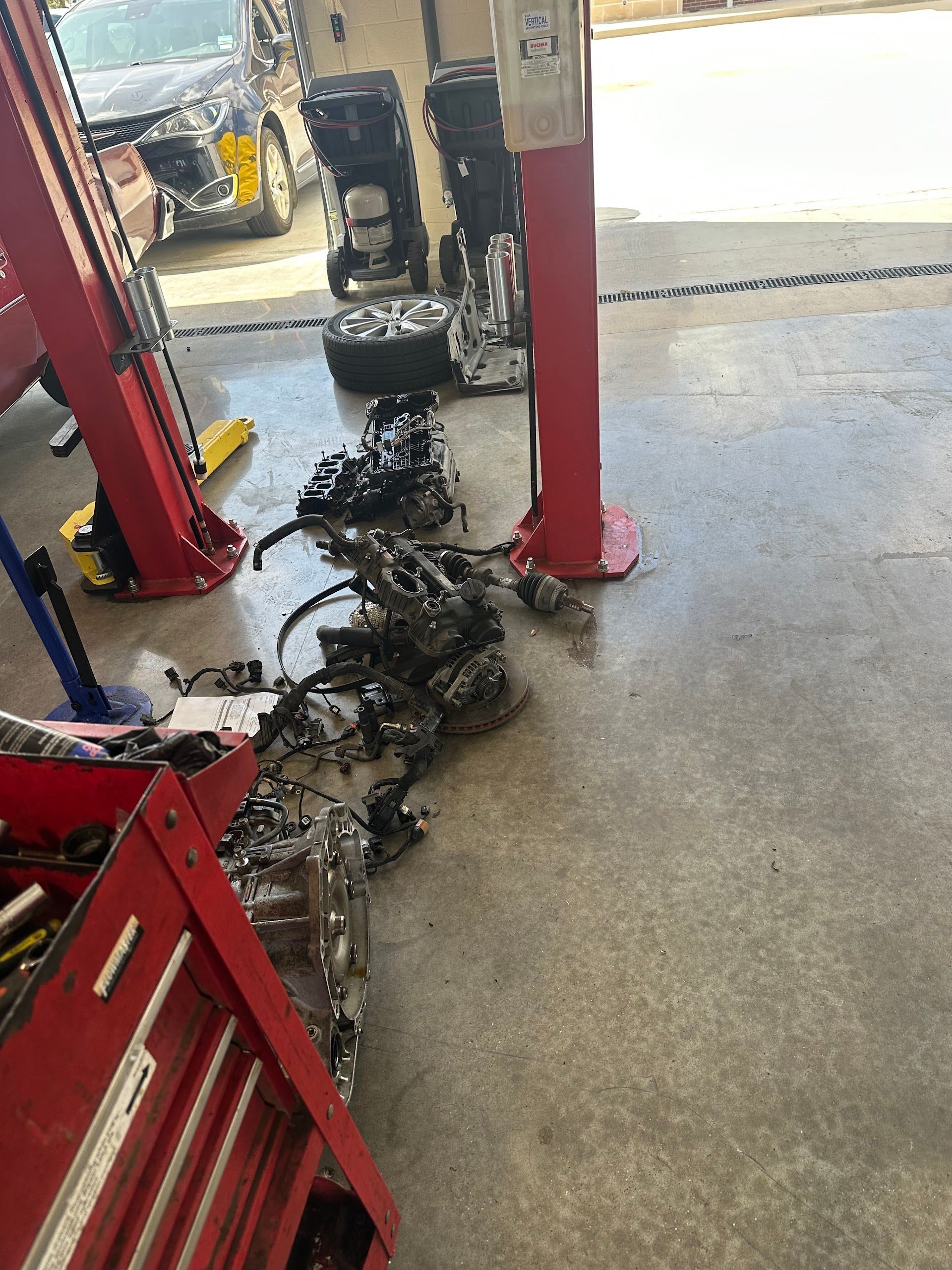 Engine And Transmission Parts On Shop Floor | Locals Automotive Repair