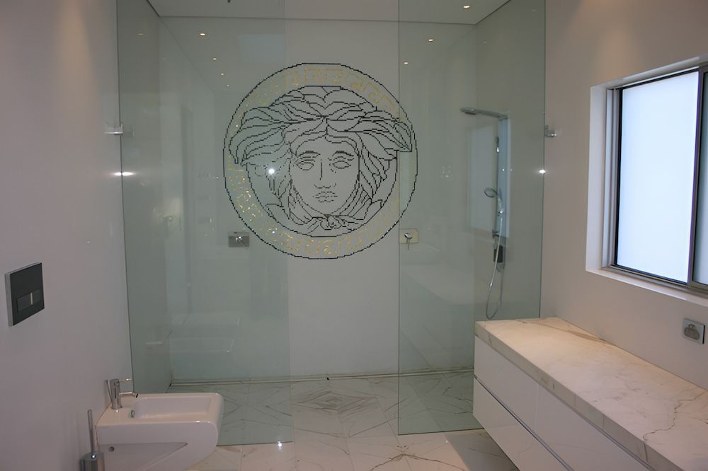 A Bathroom With a Picture of Versace on the Wall — All Glass Balustrading Systems in Wetherill Park, NSW