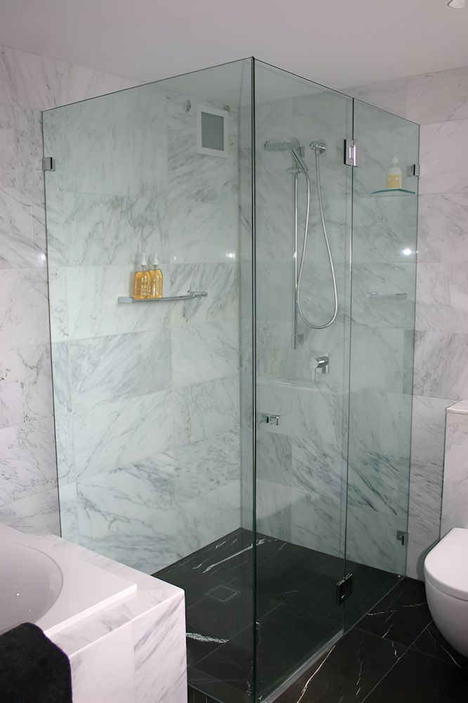 A Bathroom With a Walk in Shower and a Toilet — All Glass Balustrading Systems in Wetherill Park, NSW