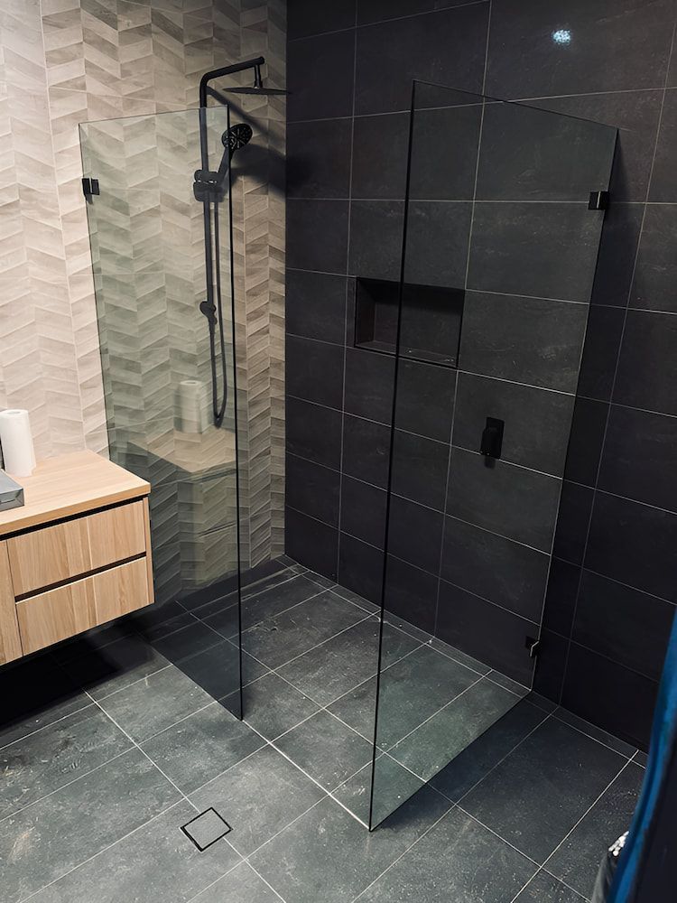 A Bathroom With a Walk in Shower and a Sink — All Glass Balustrading Systems in Wetherill Park, NSW