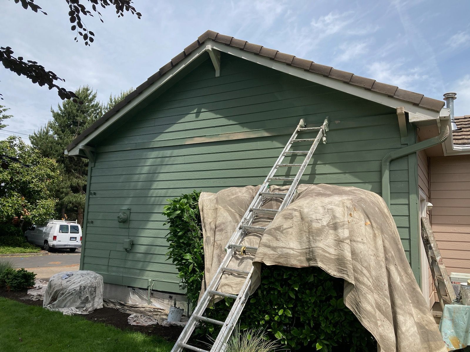Back of the house painted in olive green – Springfield, OR - Don Ball Custom Care Painting