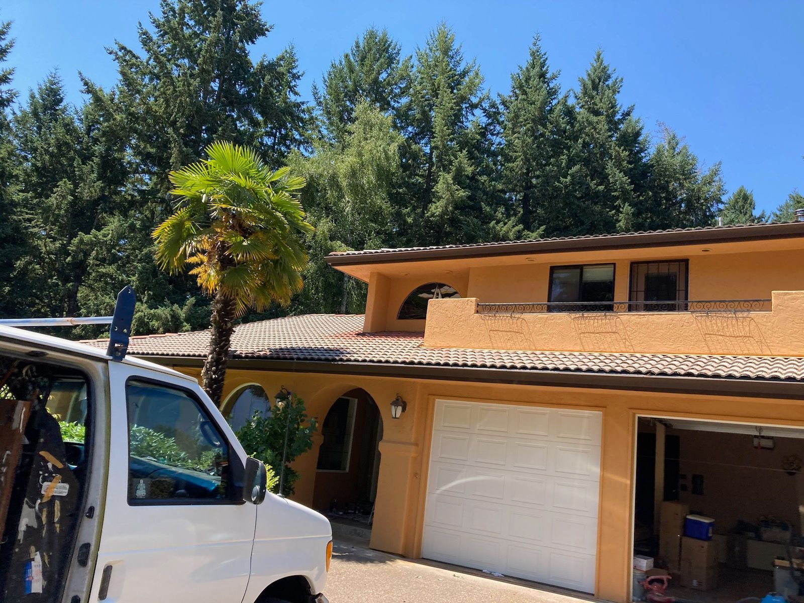 A house with garage and a yellow orange wall – Springfield, OR - Don Ball Custom Care Painting