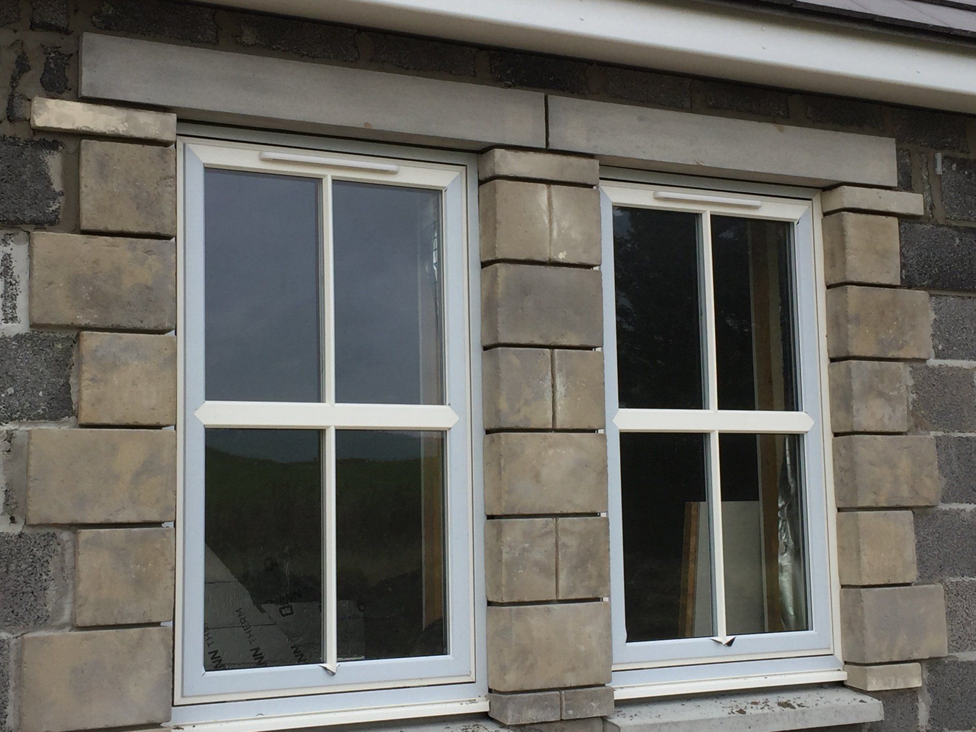 Bespoke stone feature around window