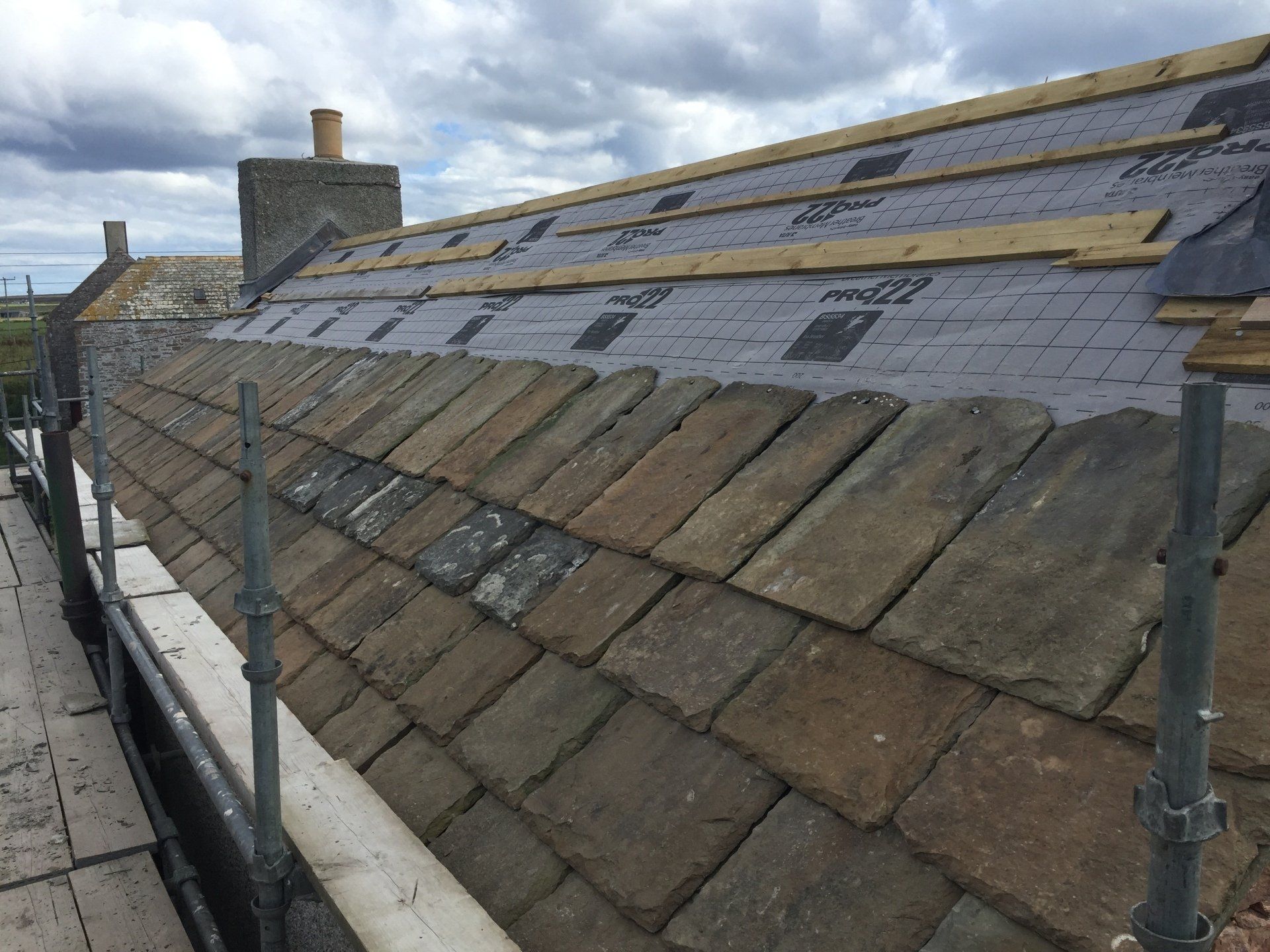 Caithness listed building using reclaimed Caithness slate for roof - during work