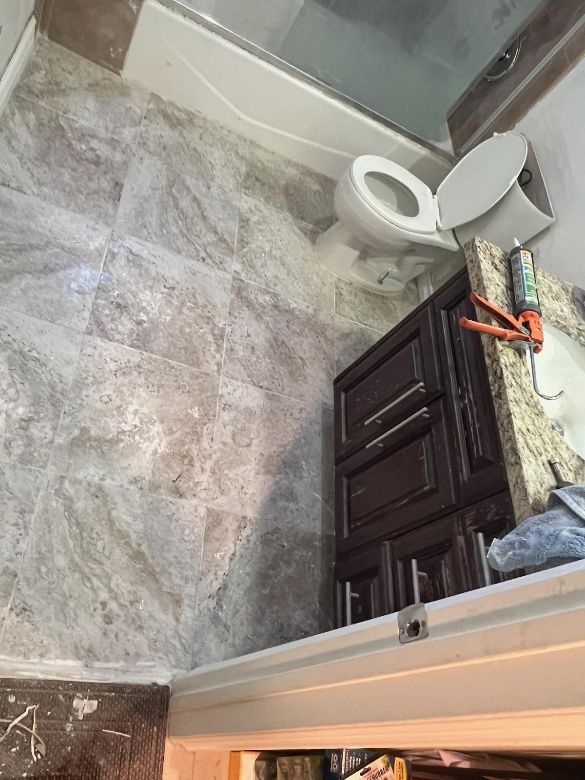 A Bathroom With a Toilet , Sink , and Shower