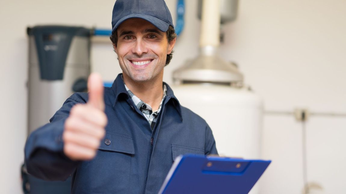 A Man is Holding a Clipboard and Giving a Thumbs Up