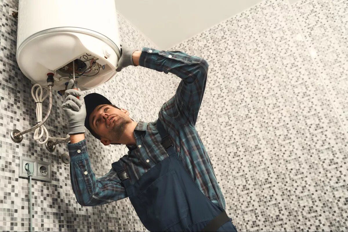 Plumber Checking the Water Heater