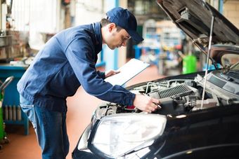 Mechanic at work in his garage