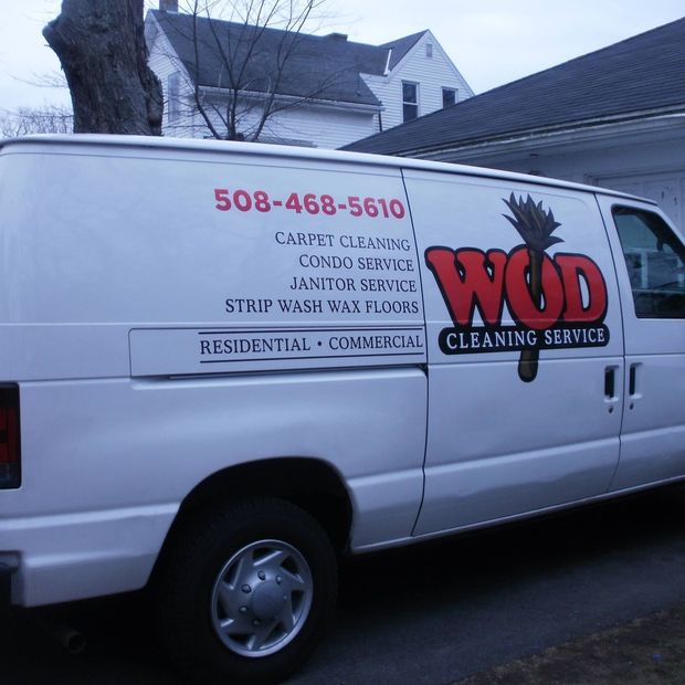 White cleaning service van with