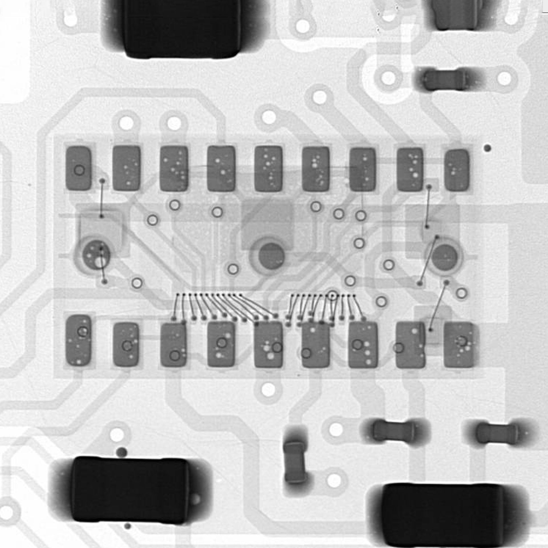 A black and white photo of a circuit board