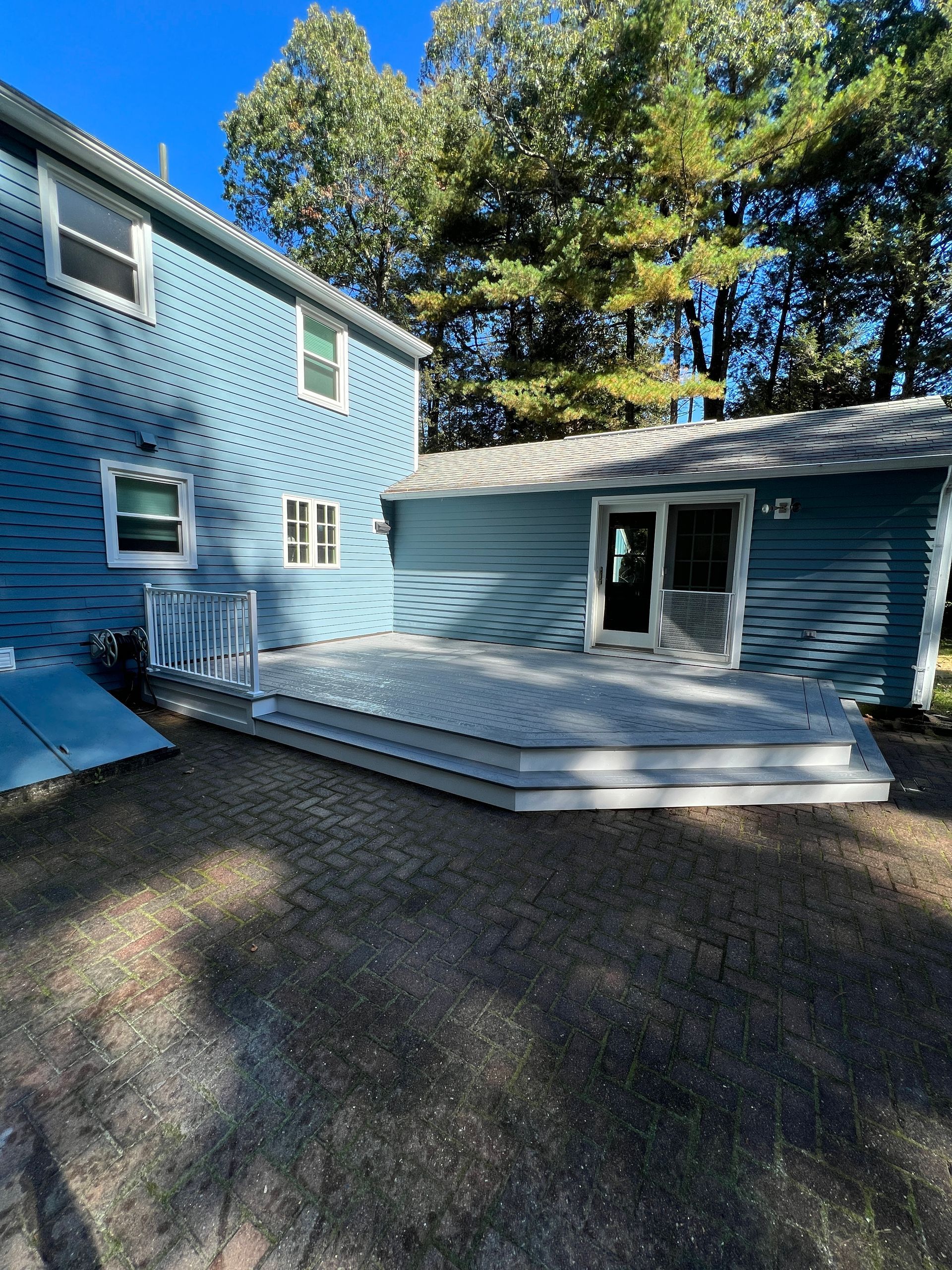 Classic Sunny Southern Porch surrounded by Live Oak Trees