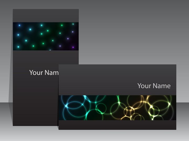 Due modelli di biglietti da visita su sfondo grigio, uno verticale con pois blu e verdi, l'altro orizzontale con cerchi al neon.