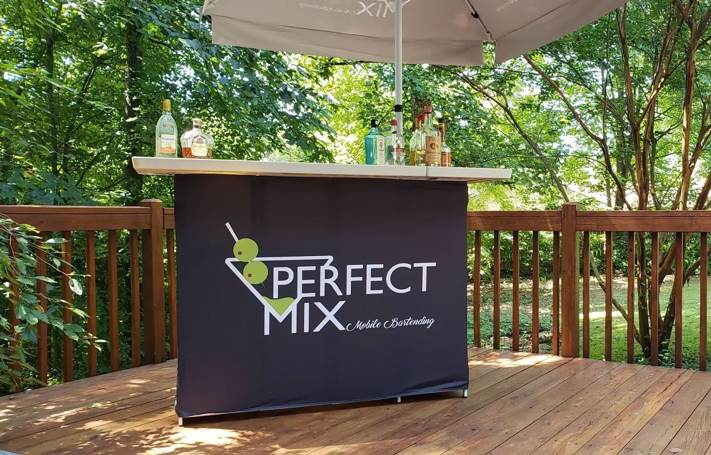 A perfect mix bar is sitting on a wooden deck