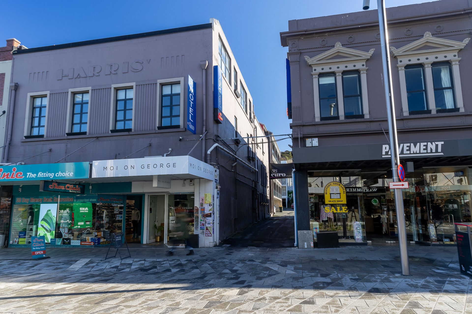 A store front with the word pavement on it