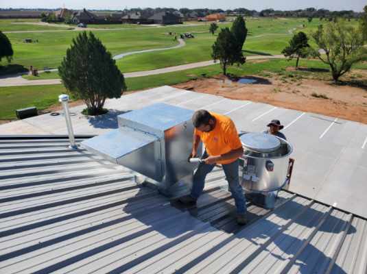 Two air conditioning units outside