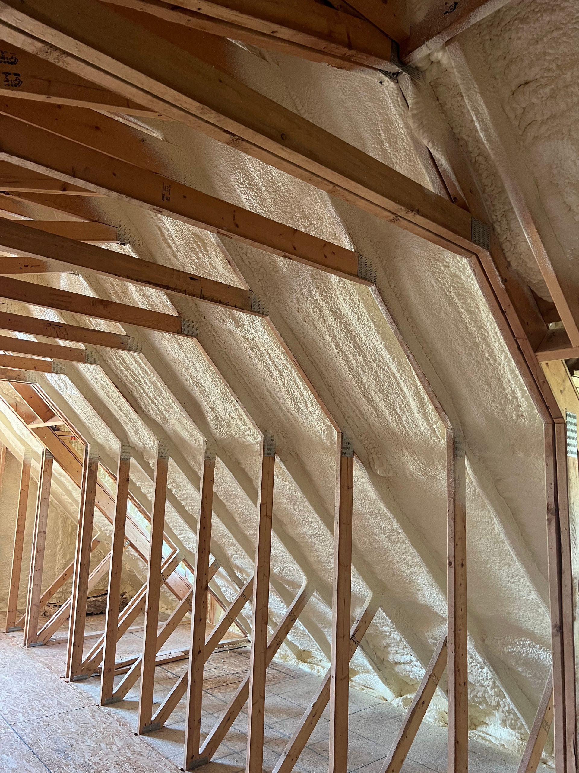 a wooden door is being installed in a room