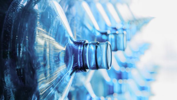 Close-up of clear water bottles for spring water delivery - Indian Peaks Spring Water