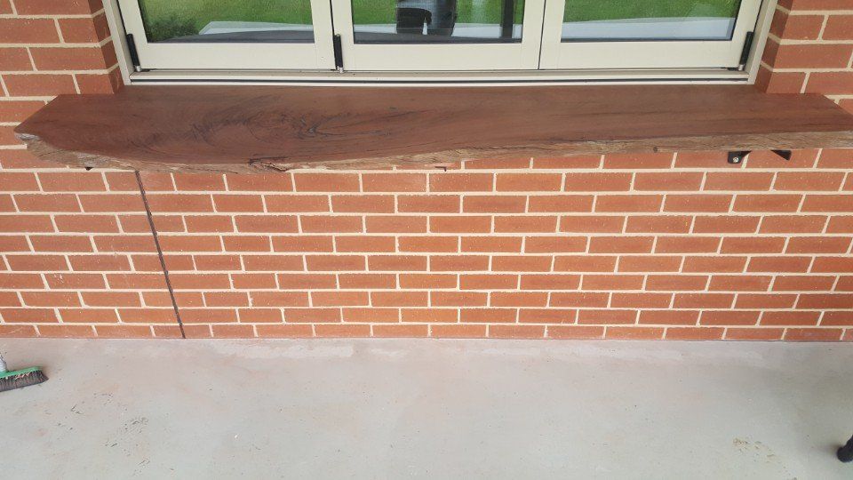 View of a wooden plank installed on the exterior window