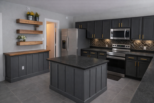 Dark gray kitchen with island, cabinets, countertops, stainless steel appliances, and wood shelves.