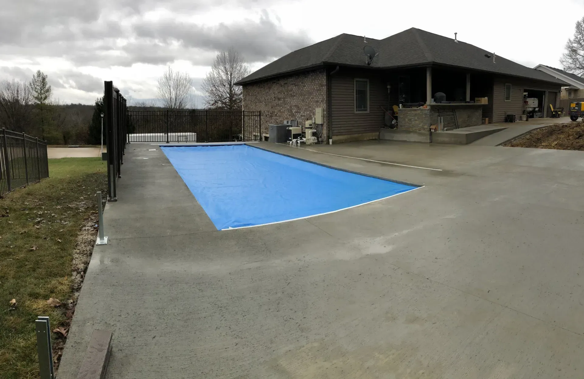 covered pool in a side yard