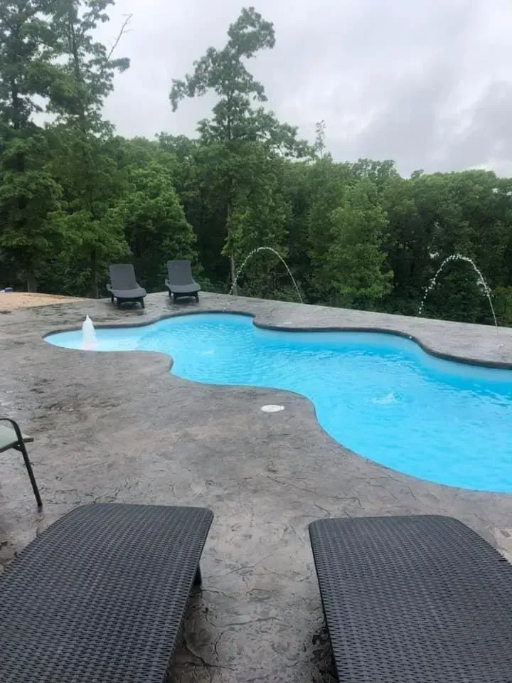 freeform pool with water features