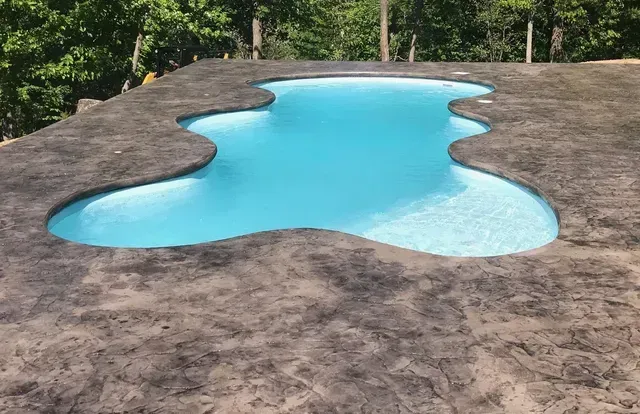 Stmaped and Stained Concrete along a pool edge