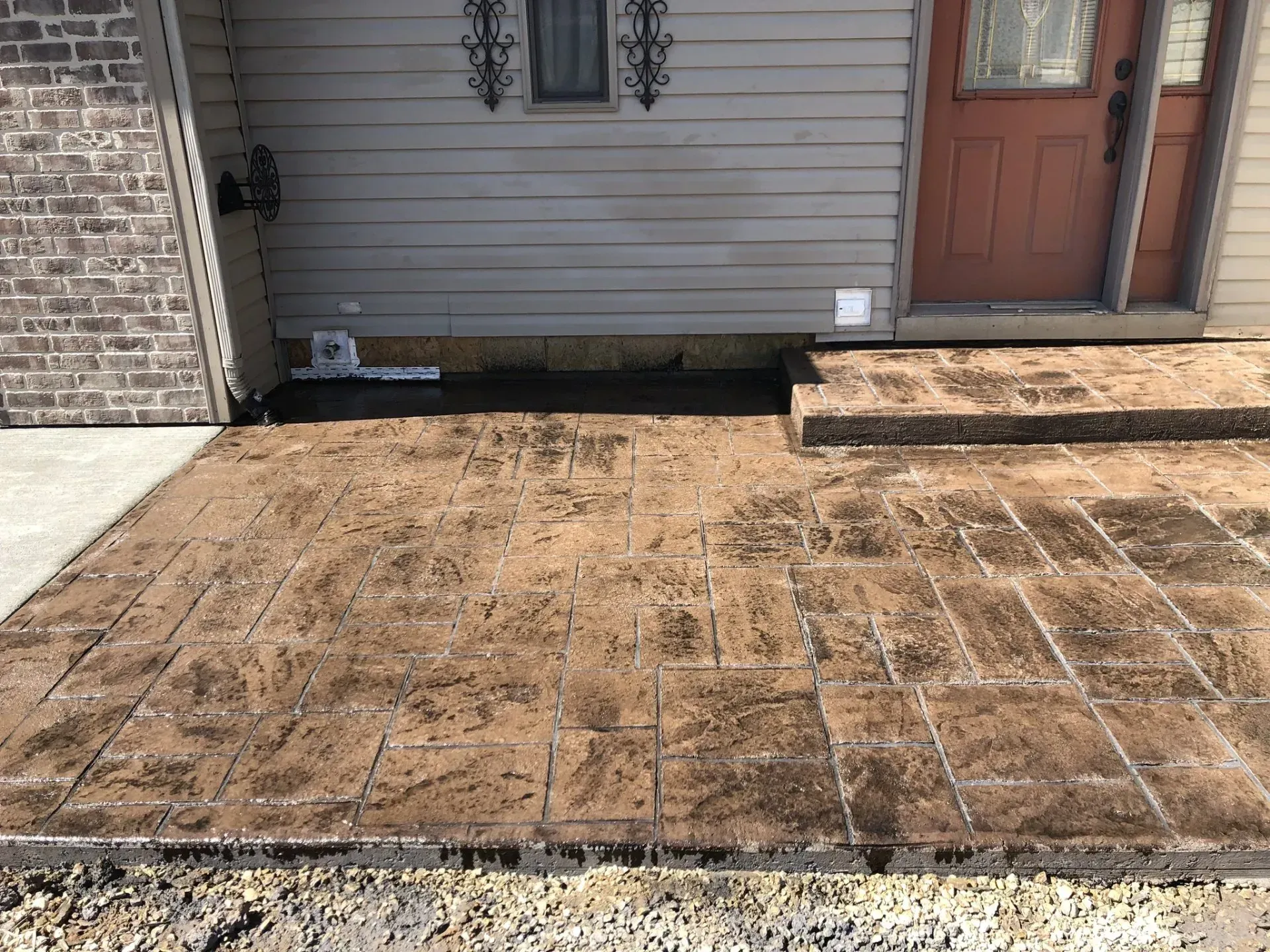 stamped and stained concrete front patio