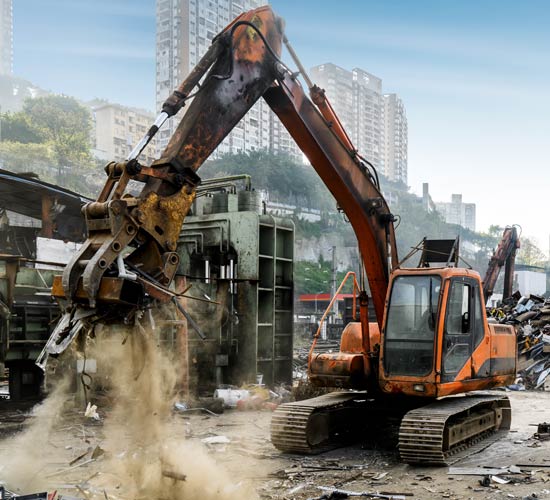 Crane Machine on Demolition Site — Jackson, MS — Tri-Miss Services, Inc.