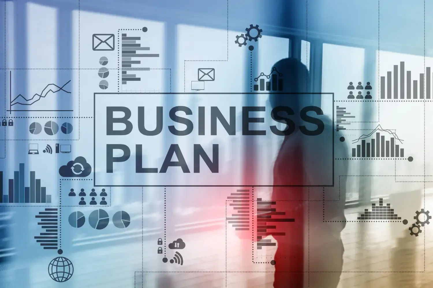 A man is standing in front of a screen that says `` business plan ''.