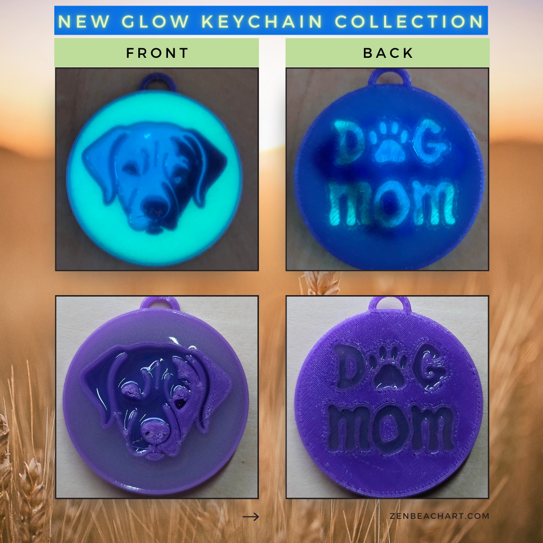 A glow in the dark keychain that says dog mom by Zen Beach Art.