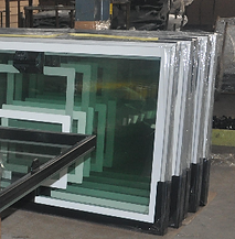 A stack of glass frames sitting on top of each other