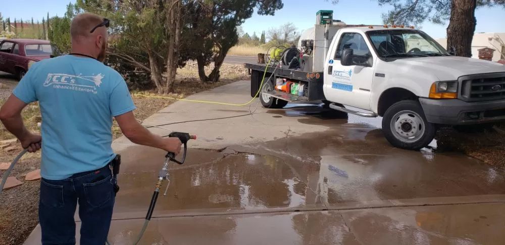 Man Cleaning the Tire Mark — Sierra Vista, AZ — CC's Enhanced Exteriors