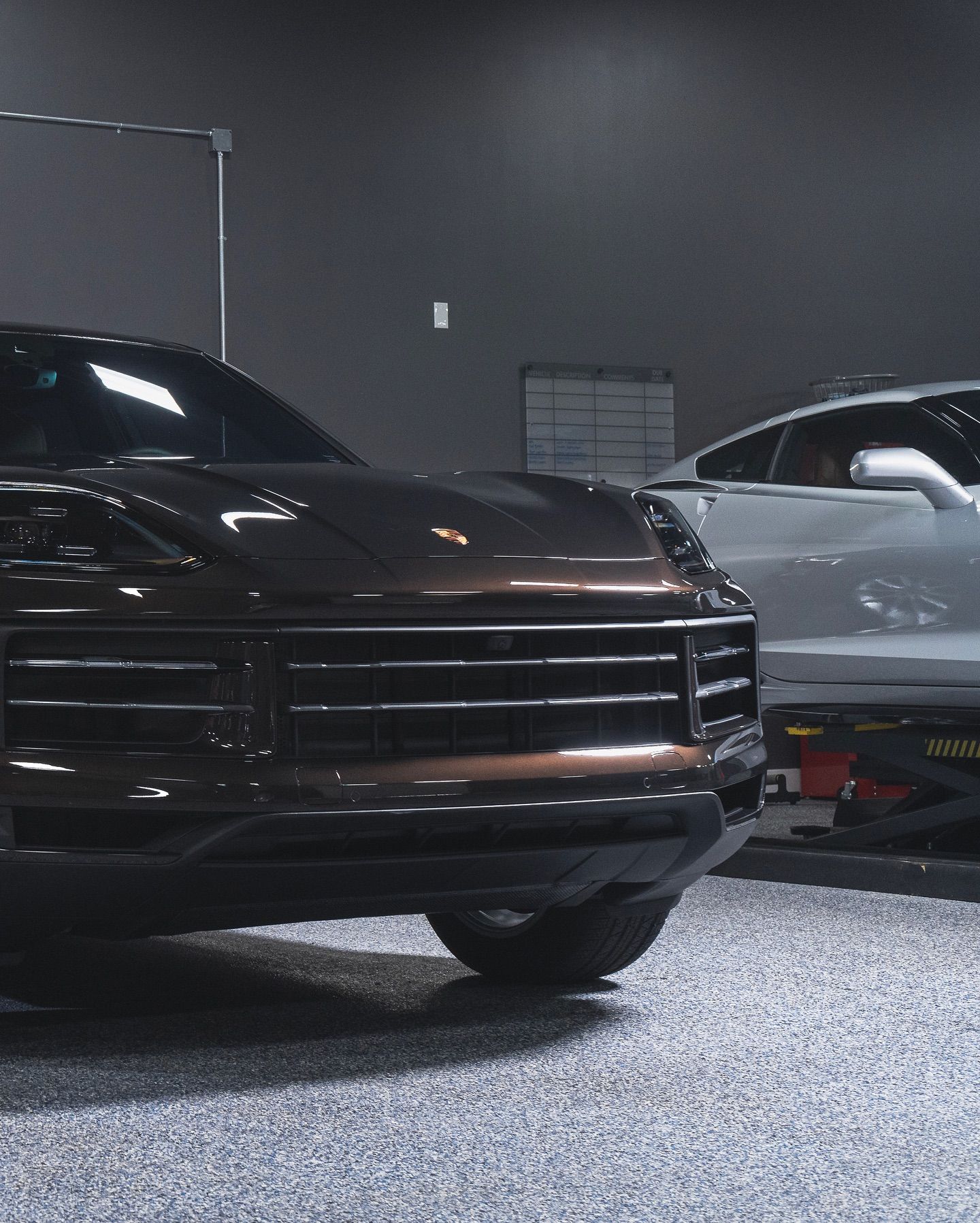 Sleek luxury car showing a high-gloss finish from ceramic coating.