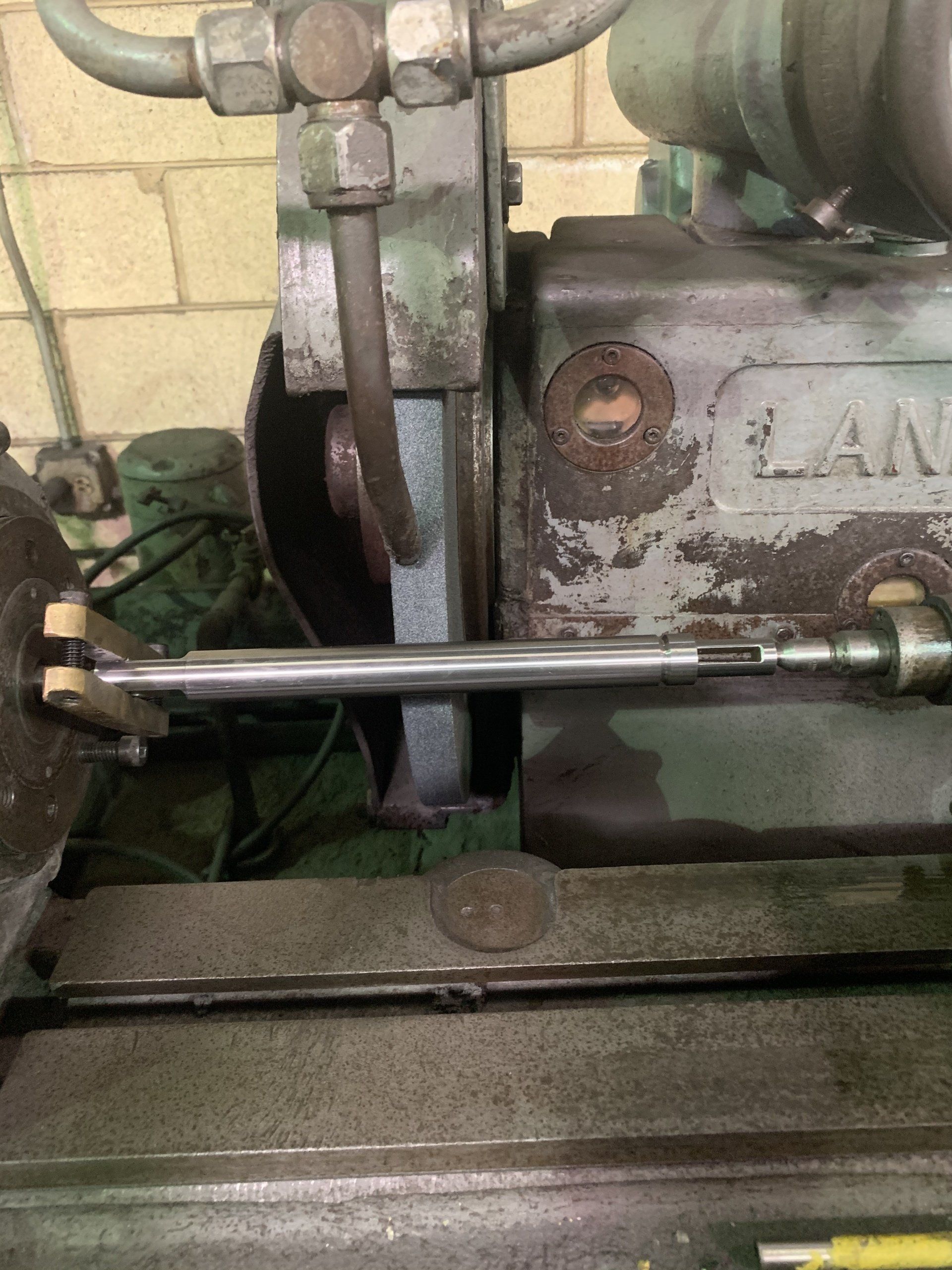 A close up of a machine with a hose attached to it.