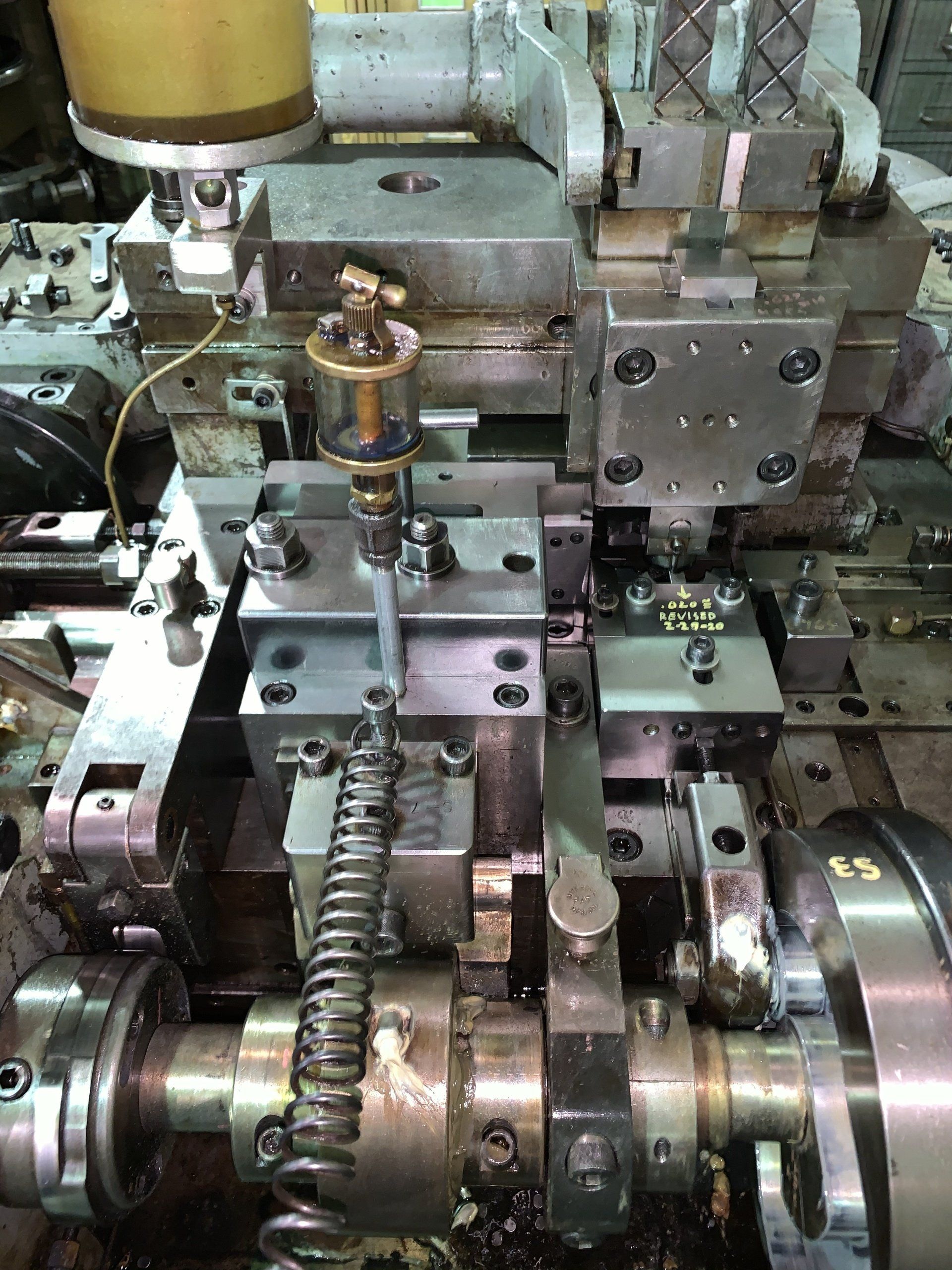 A machine is sitting on a table in a factory.