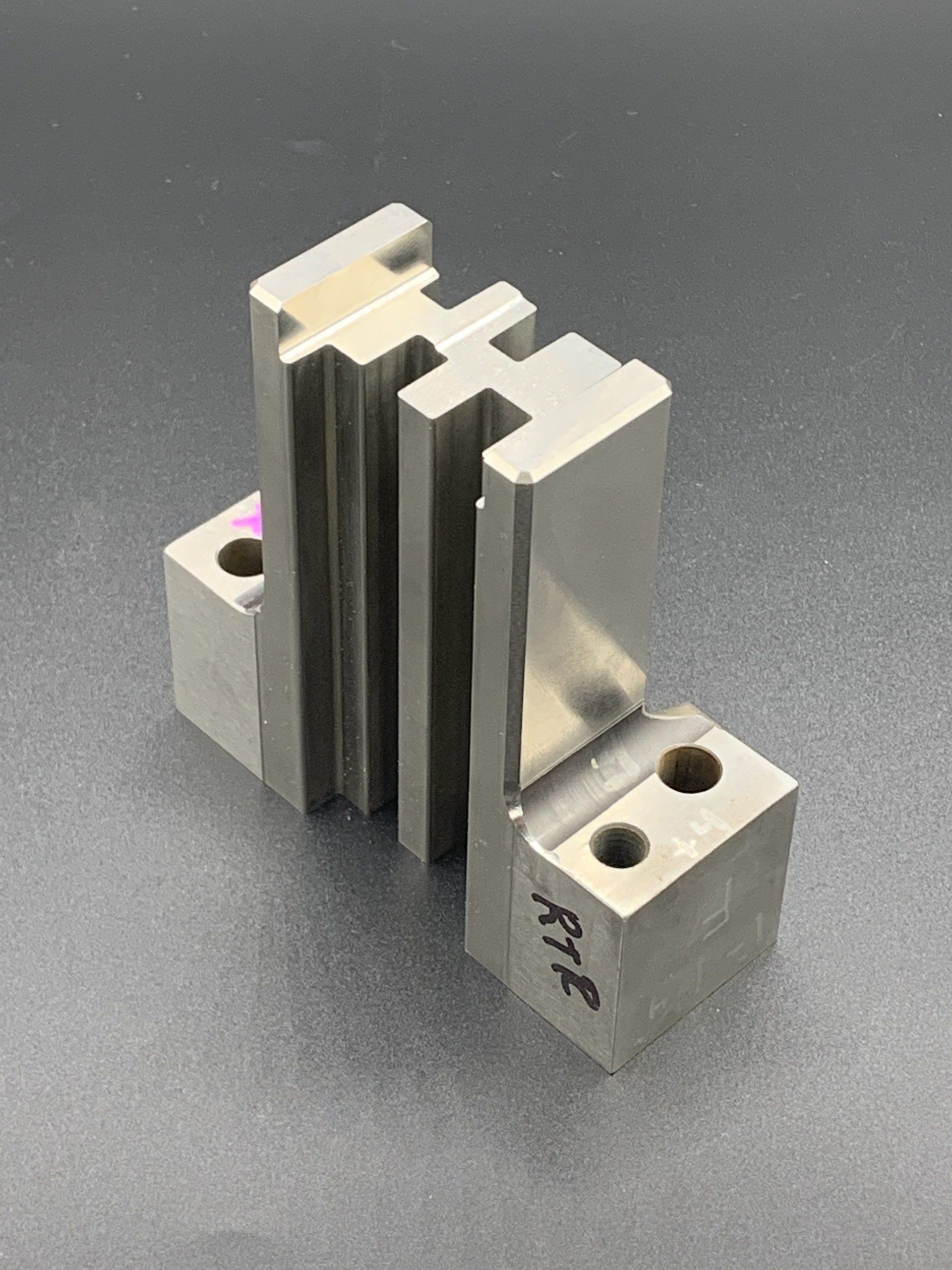 A piece of metal is sitting on top of a table.