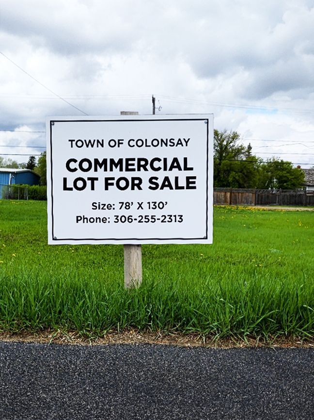 A sign that says town of colonsay commercial lot for sale